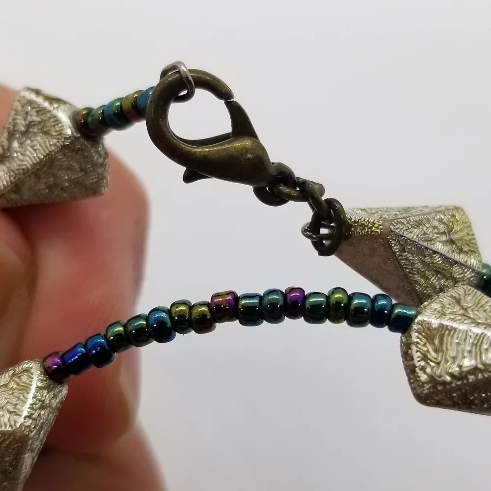 oil slick seed beed and silver wrap bracelet